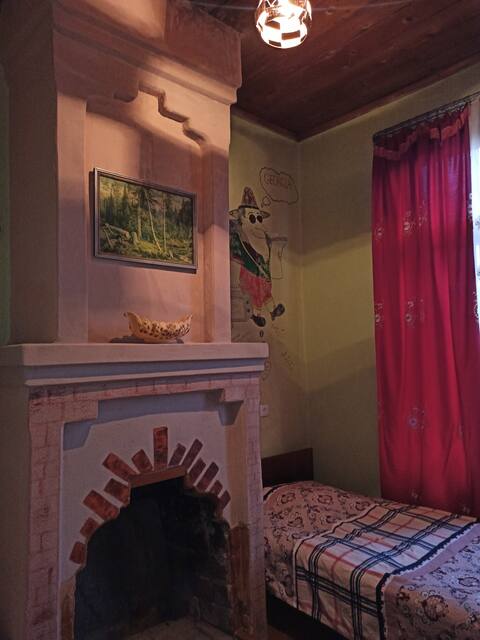 One-bed room with indoor fireplace