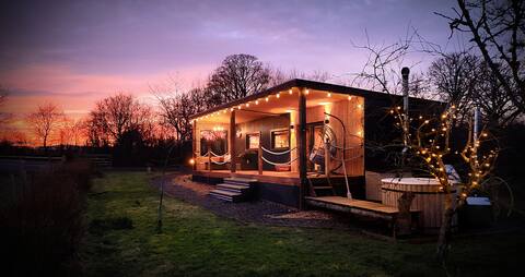 Bastle Retreats Cabin with wood-fired hot tub