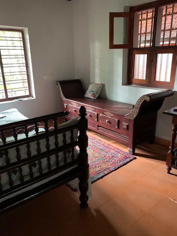 Bedroom on first floor with antique furniture 