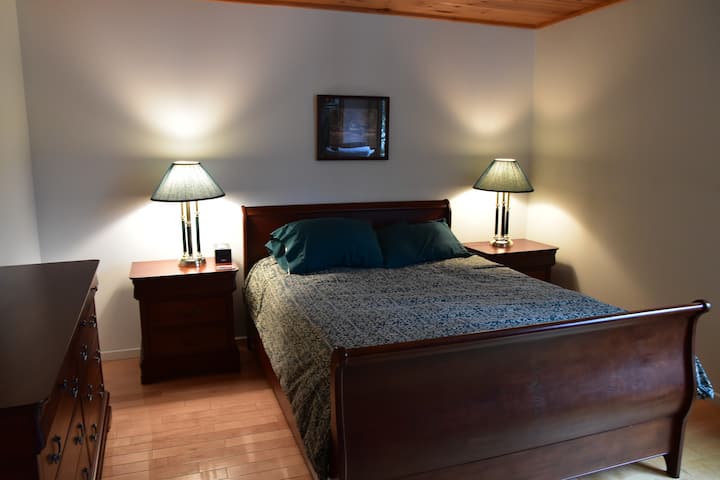 Main Floor Bedroom - Queen Size Bed. Central Air Heating with Supplemental Baseboard Heating in All Rooms. 
All Beds Have Down Duvets