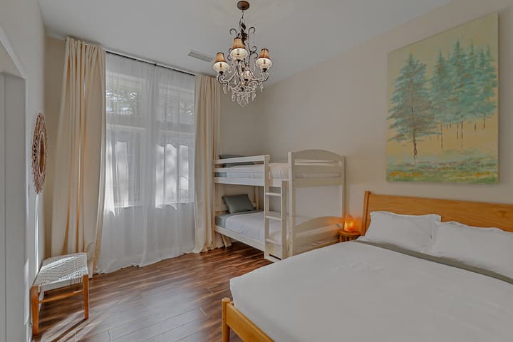 Bedroom 3: Boasts plenty of light, kids' toys, and an ensuite bathroom.