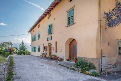 Group house in Trentino with multipurpose hall