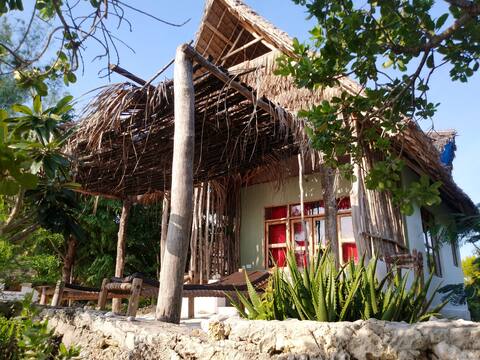 Afya village: King rock room with ocean view