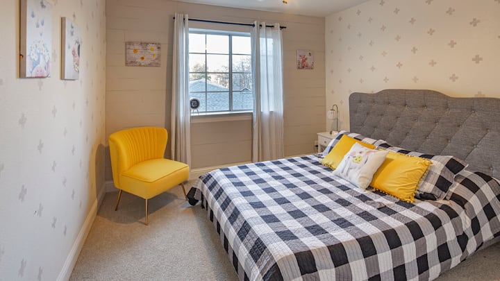 One of the upstairs bedrooms has a queen bed