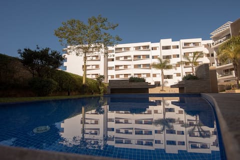 Blue paradise,a ray of sunshine between sea & pool