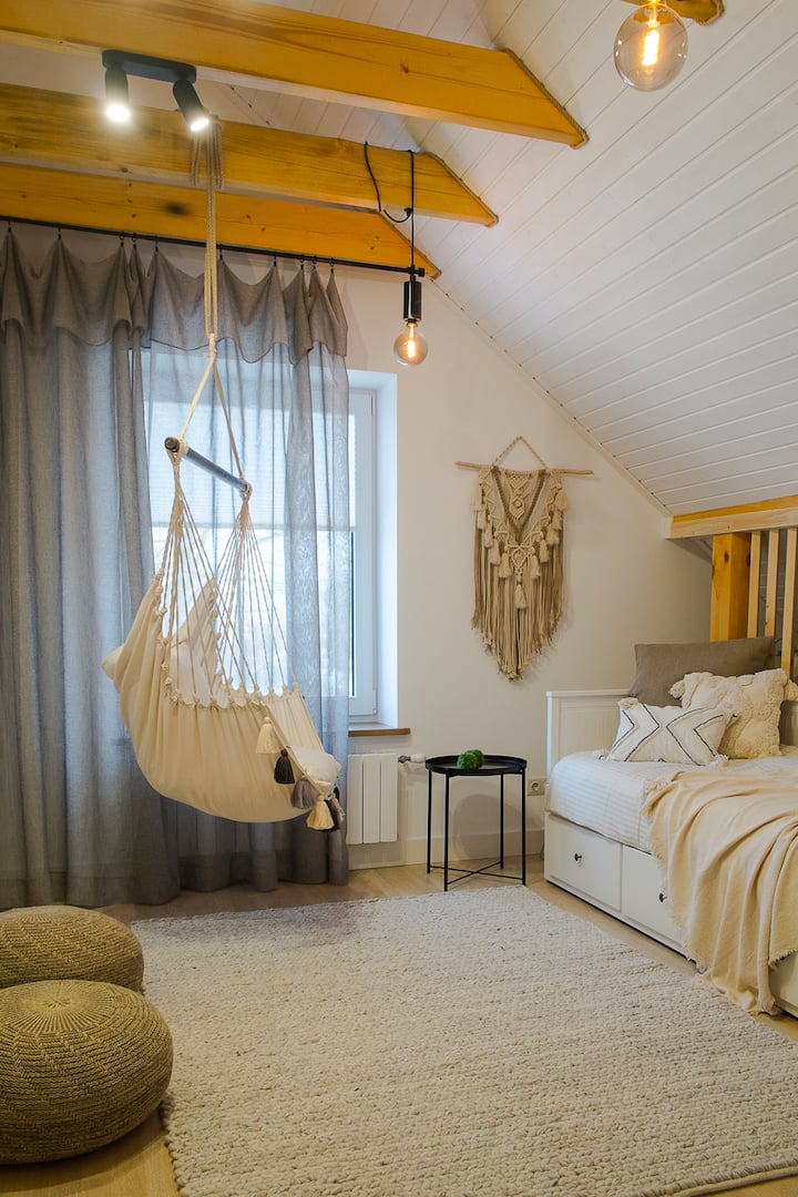 Bedroom on the second floor with sand colors