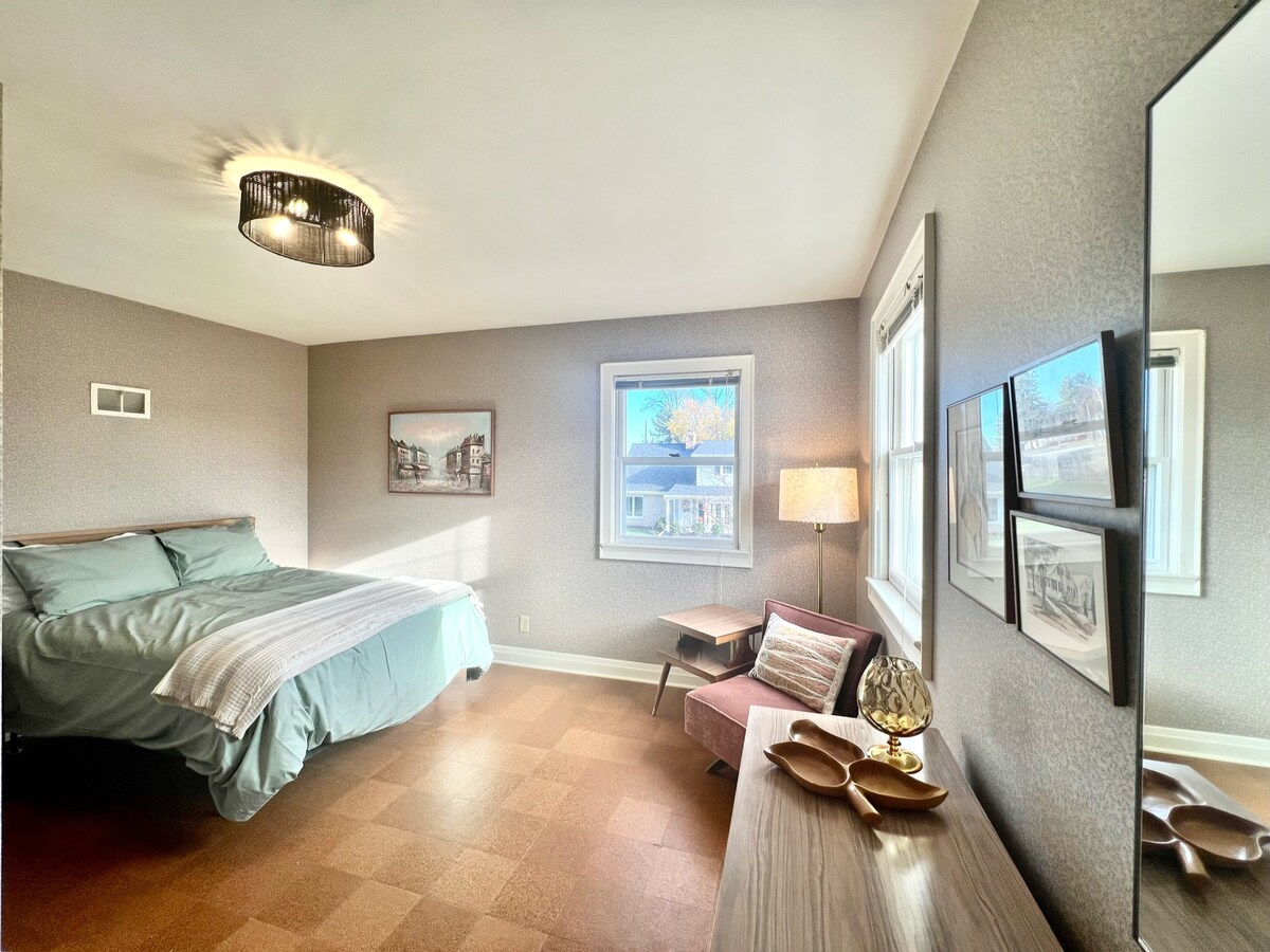 Bedroom #3 features a queen size bed and a nice lounge area.