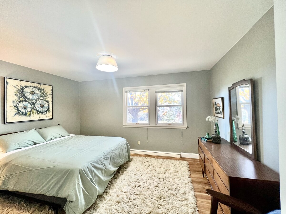 Bedroom #1 features a queen size bed and a large mirror to get ready in the morning. This is the only bedroom located on the first floor. This also has a full bathroom immediately next to it.