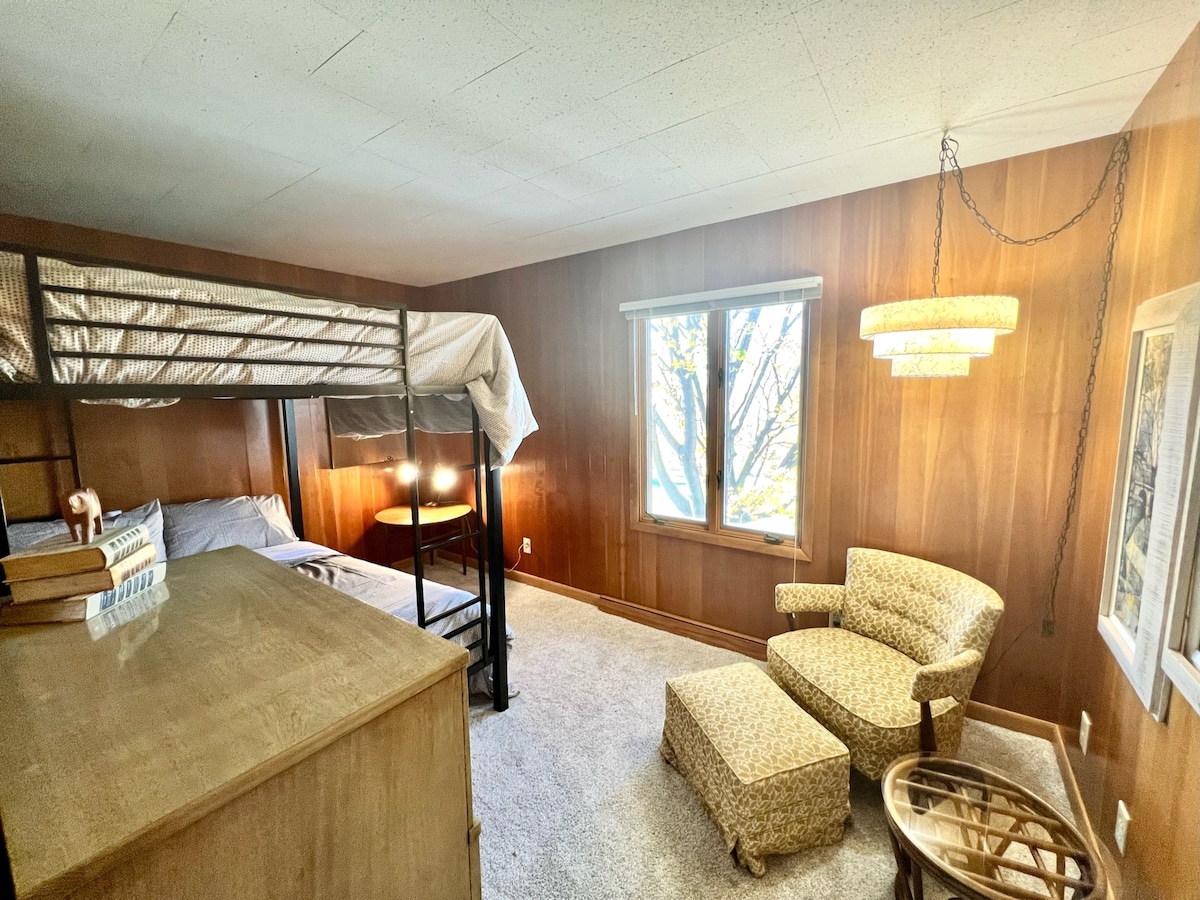 Bedroom #4 features 2 full-sized bunk beds and has a great place to sit down. 
