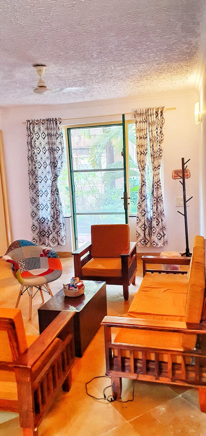 Living room .. shows entrance door in the background. Pic clicked from dining table