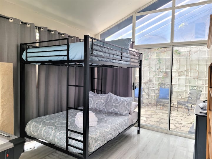 EXTRA SLEEPING QUARTER WITH FULL BUNK BEDS IN THE GAME ROOM