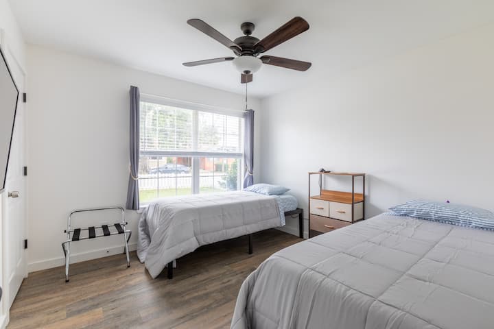 Middle bedroom with two twin XL beds.