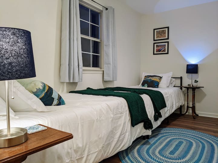 Two twins in this cozy room with a hidden play nook