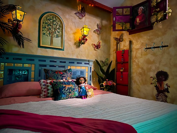 ENCANTO King Bedroom Suite for magical family adventures! Pocket doors to Kids' room can be left open or locked and closed.  Huge TV with Roku.   (Main Level). Costumes for all Madrigals!  Star Wars Bathroom is detached, just 3 steps into hallway.
