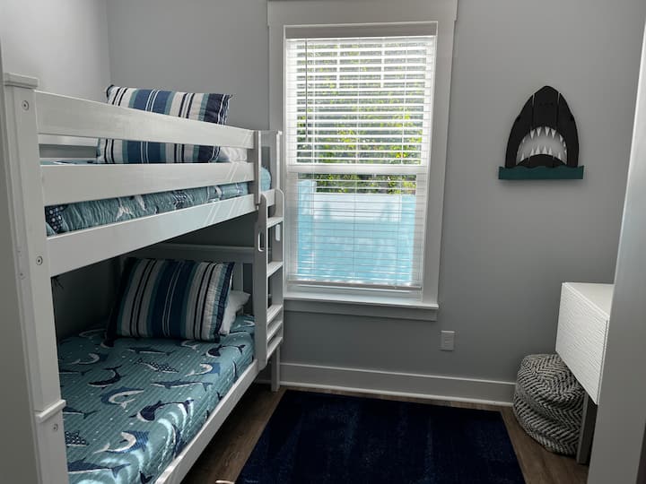 Bunkroom features twin over twin bunk beds.