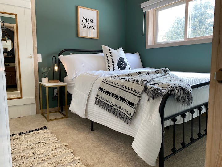 Crawl into this queen bed and dream like you’re on vacation! This room has a closet with hanging space and room to stash a suitcase. There is a “Jack and Jill” style bathroom accessible from both bedrooms in the home.