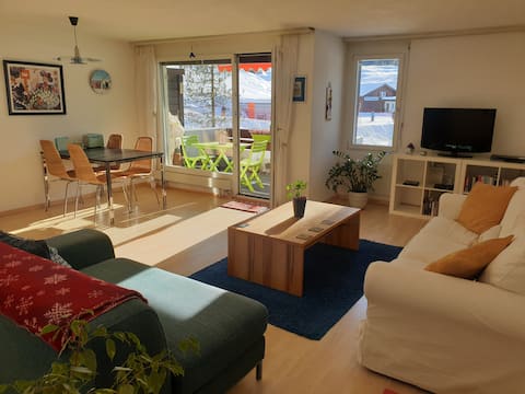 Bright holiday apartment overlooking ski slope