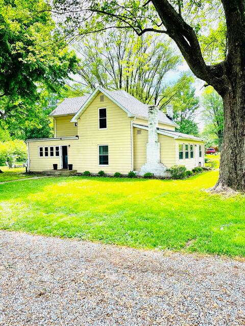 Rustic Farmhouse with Spacious Wooded Lot