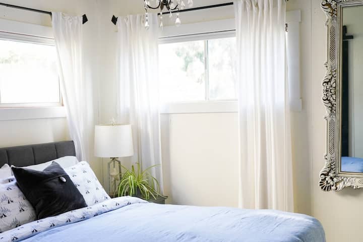 A second bedroom with queen size bed.

Cute, right? 

But more than cute, we are oh so comfort-focused here. See the next photo ;)