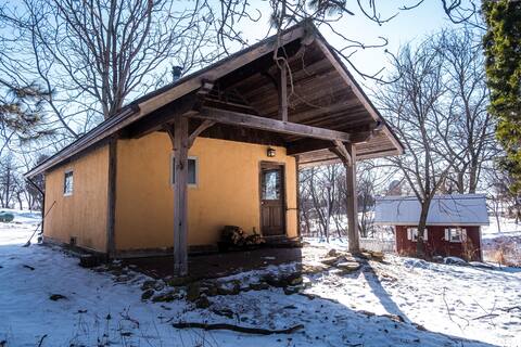 Private straw bale sauna house on organic farm