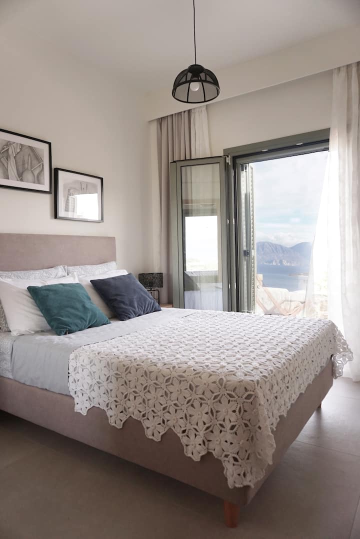 spavaća soba s pogledom na more 