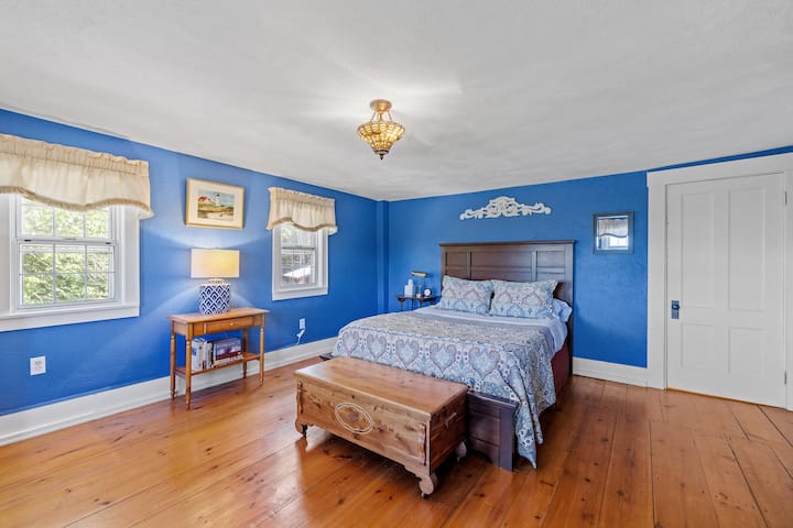 The Blue Room has a queen bed and views of the mountains