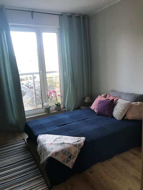 Top performing Airbnb: Charming apartment with a garage near the airport in Ławica