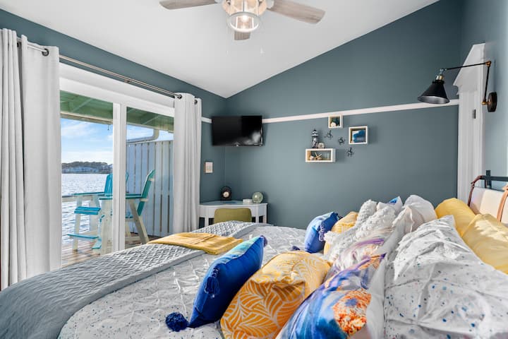 Master bedroom has a smart tv so you can either be watching the water outside or a show.