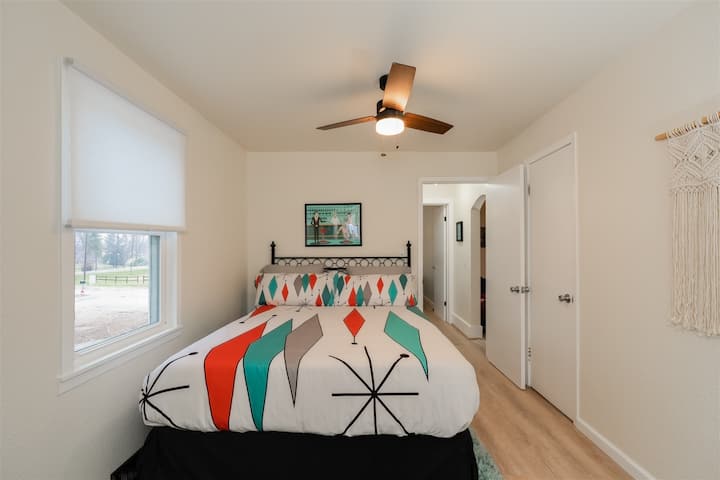Cool Primary Bedroom  with queen bed