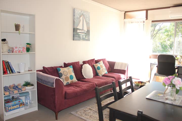This is the living & dining area. The couch is comfortable and has enough space for everyone. Dining area with a table and 4 chairs and a study desk . The balcony provides a relaxing outdoor space, free WiFi throughout the property.

