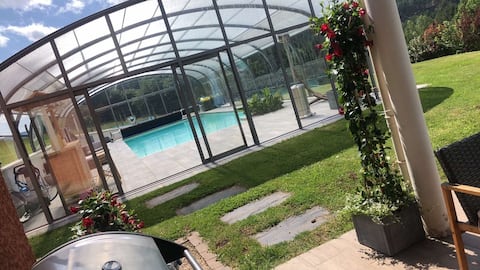 Beautiful villa among fir trees with pool