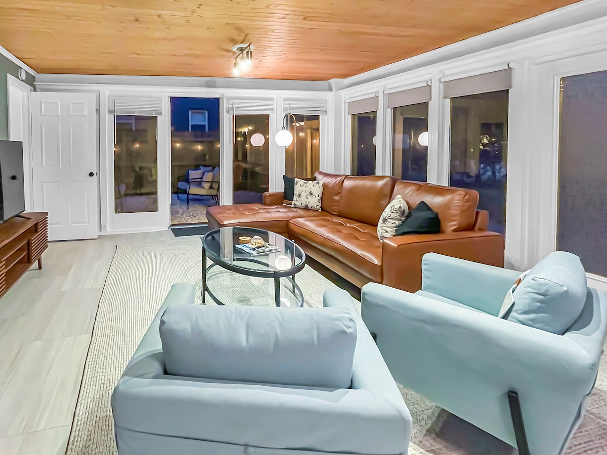 Living room with view of side patio