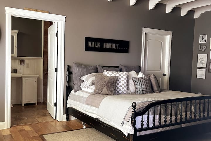 Master suite located on main floor, includes full bathroom with deep walk in shower and walk in closet. 