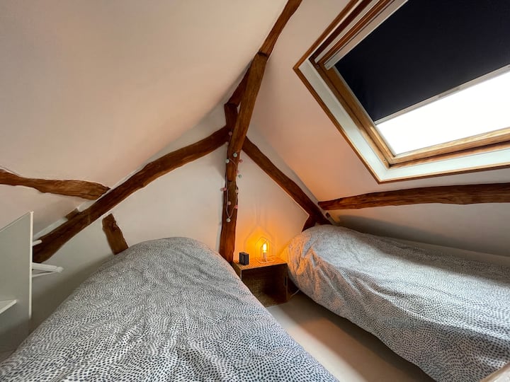 Small upstairs bedroom with two 90x190cm single beds