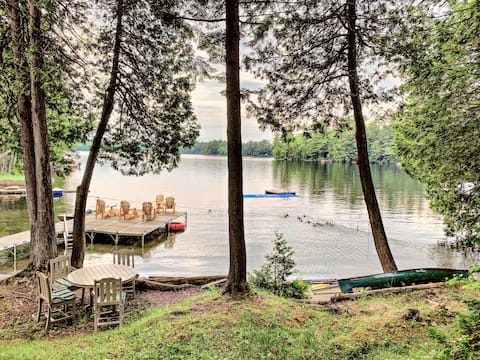 Quiet, 6 bedroom lakefront home with sandy beach