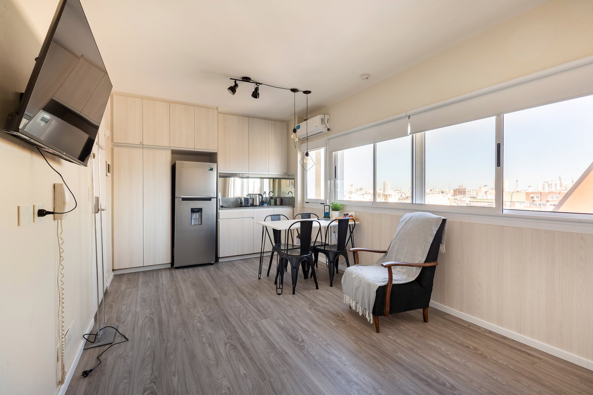 A bright and central studio with a pool and great view