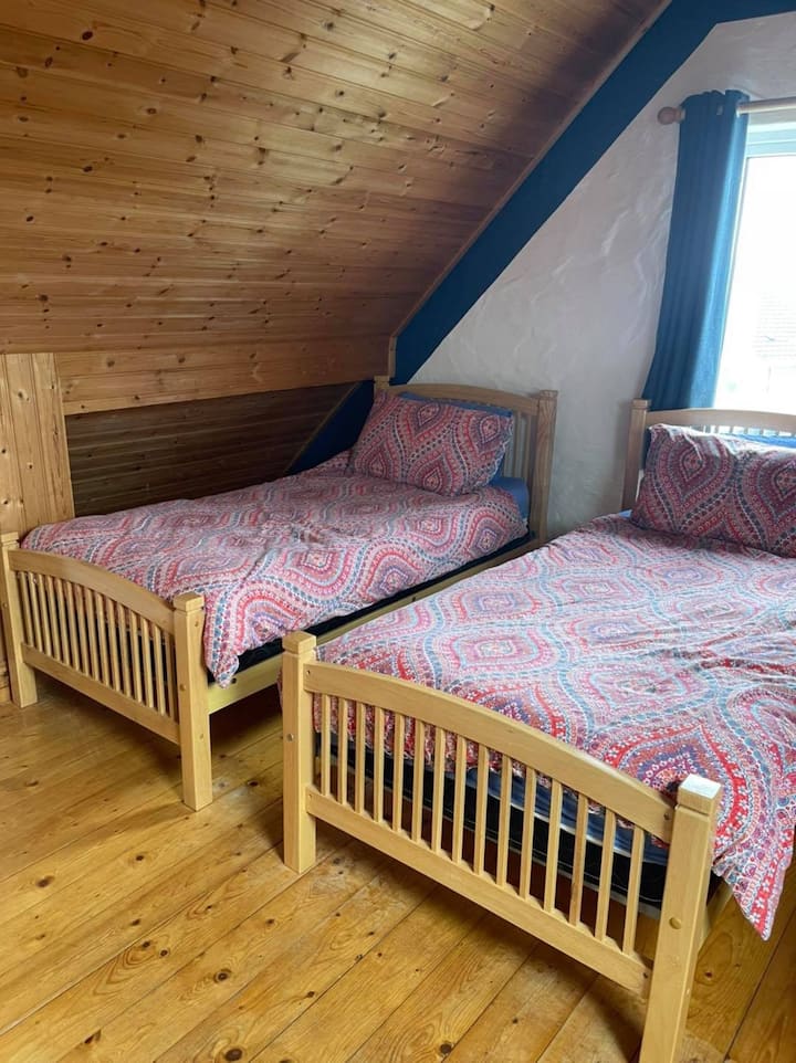 Bedroom 4 has three single beds and a shared bathroom with bedroom 3