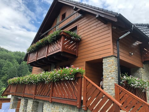 Blue apartment in a cozy cottage under the forest