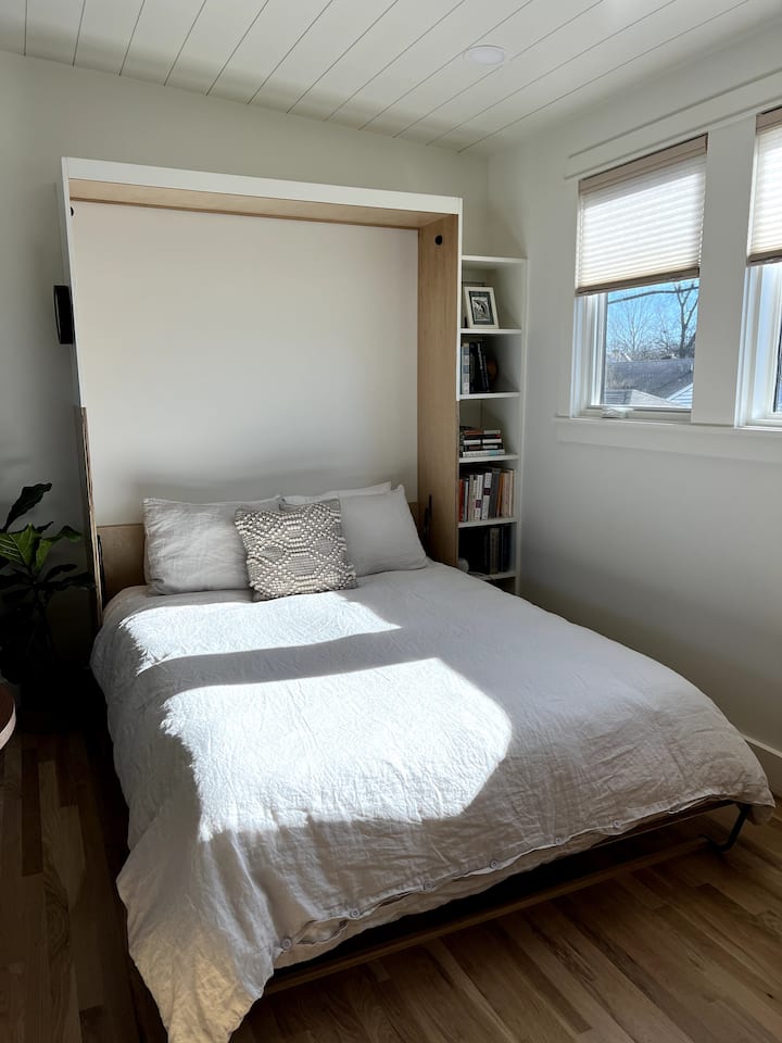 After a long day of exploring, you'll love curling up in this comfy queen bed for a good night's sleep!