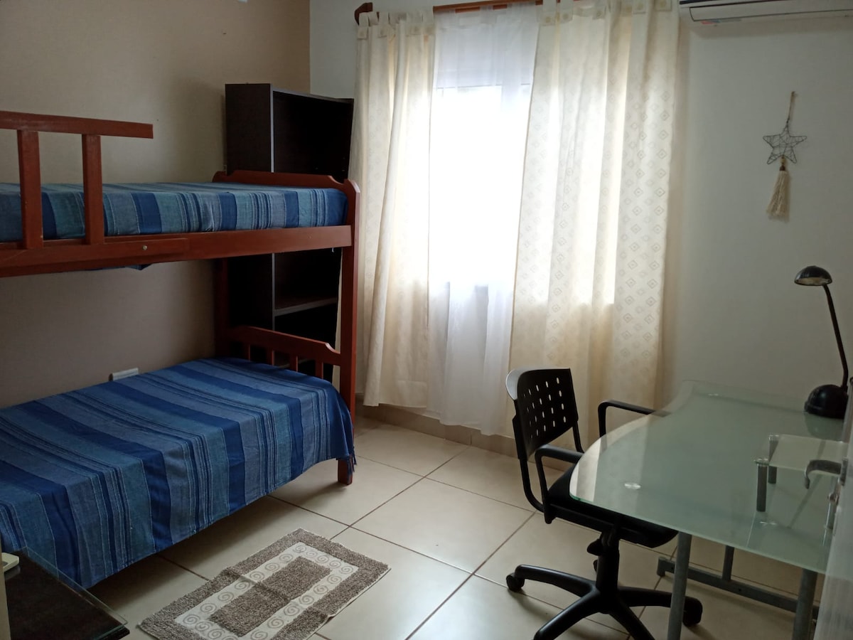 Double room. List to share with. Two comfortable beds are waiting for you plus a work space they feel like modern life often requires us. Dexcanso and a little work is perfectly combinable in La Casona!!!