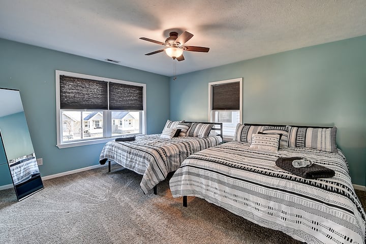 2 camas tamaño queen.