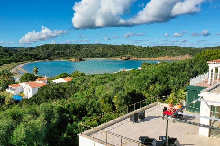 Designer house overlooking the beach in Es Grau
