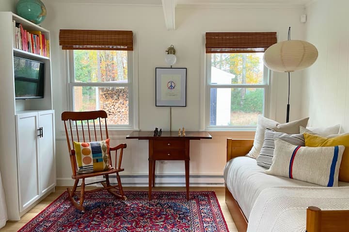 Off the main living room, you'll find the den. A space to play games, let the kids play, or cozy up with a good book. Includes a daybed that opens to include two twin beds. 