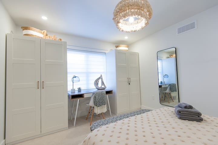 One storage cabinet available for your items. Hanging and drawer storage. Iron available for your use. Ironing board located beside washer/dryer unit.