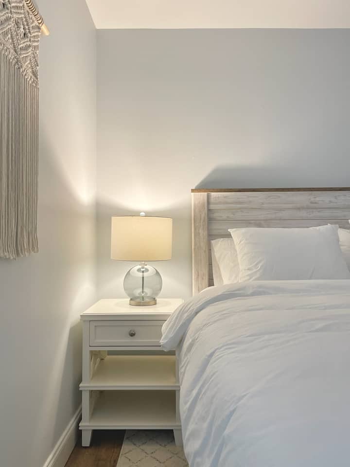 White Sands Bedroom (No. 2) has a queen bed with a desk and closet with luggage racks. Downstairs with no steps or stairs to enter.