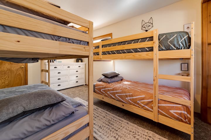 The second bedroom has two bunk beds with 4 twin mattresses. 