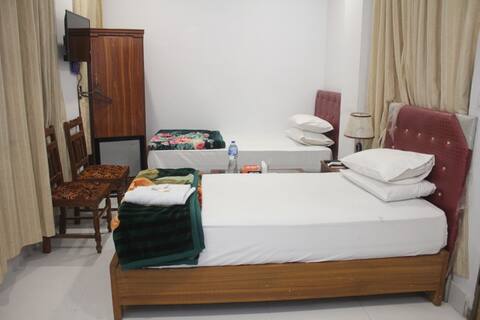 PC inn Sukkur Seprate Single bed with breakfast