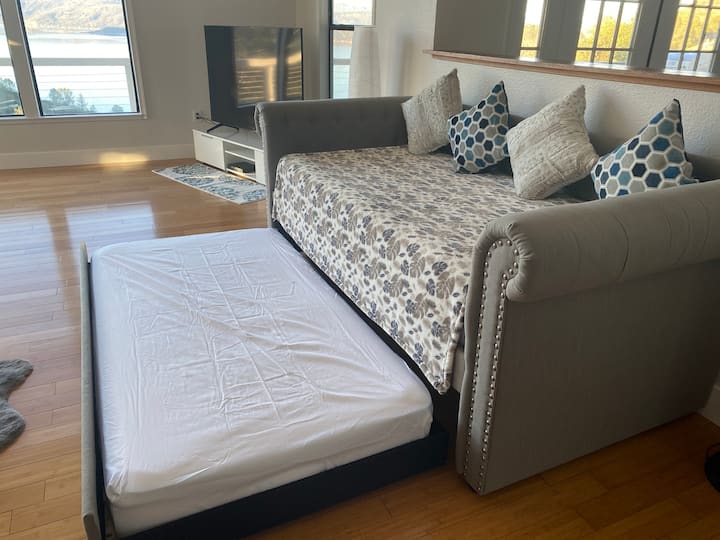 Day bed with pull out trundle; each mattress is twin sized