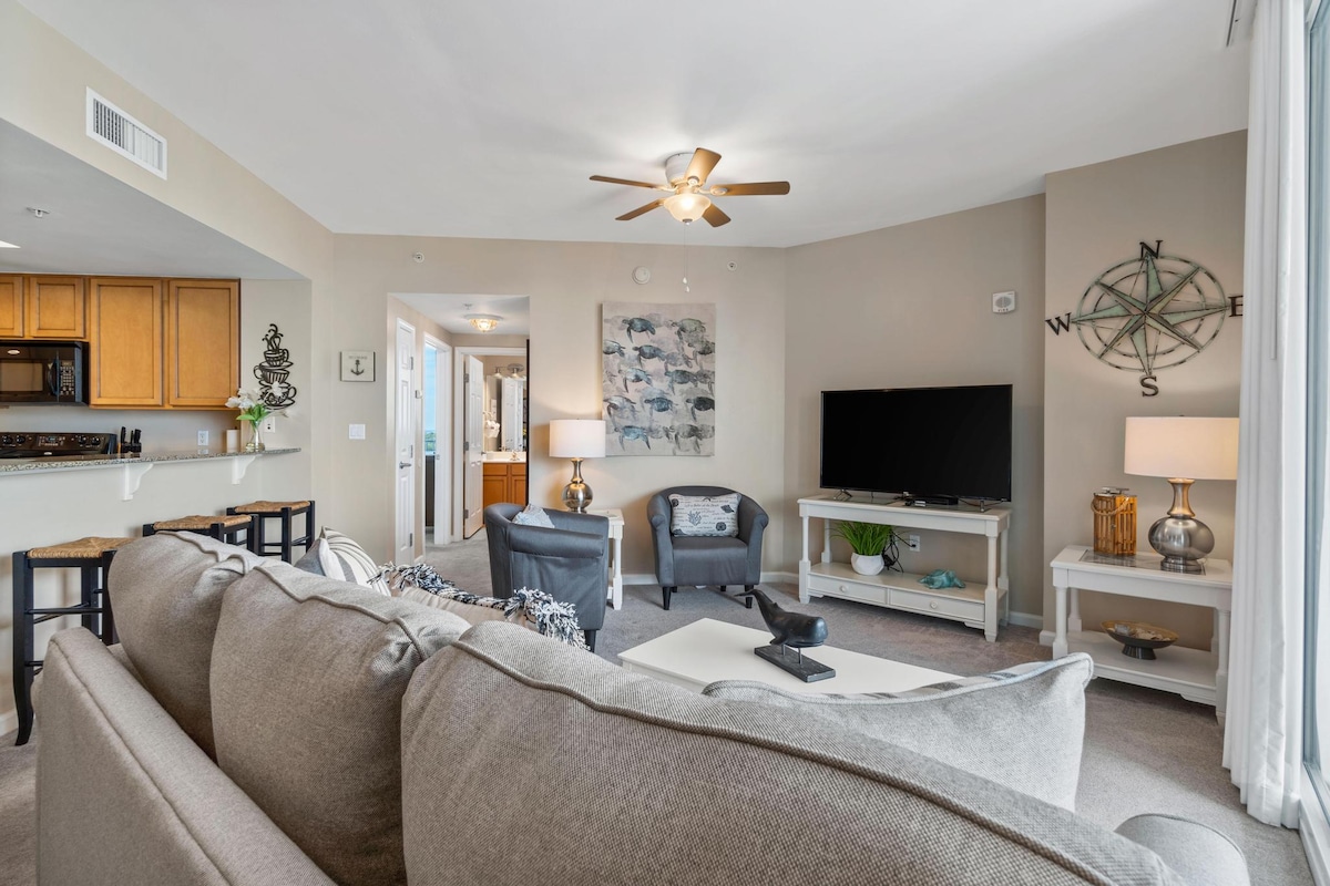 Open concept floor plan, beach inspired furnishings, a beautiful patio overlooking the lagoon pool and gulf views!