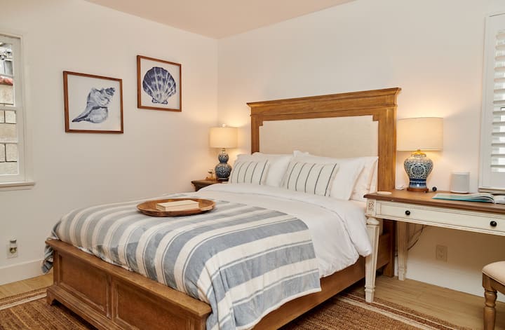 Downstairs Bedroom with Queen Bed and Desk